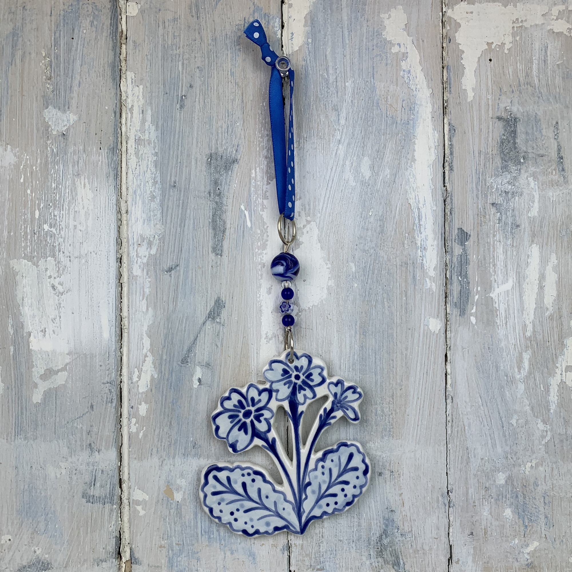 Blue Primrose decoration. Handmade in the UK